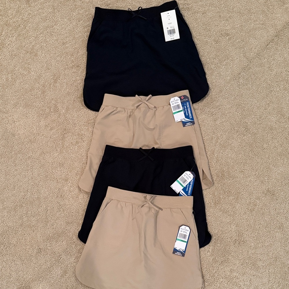 Set of Four Skorts in  navy and Tan girls size 8